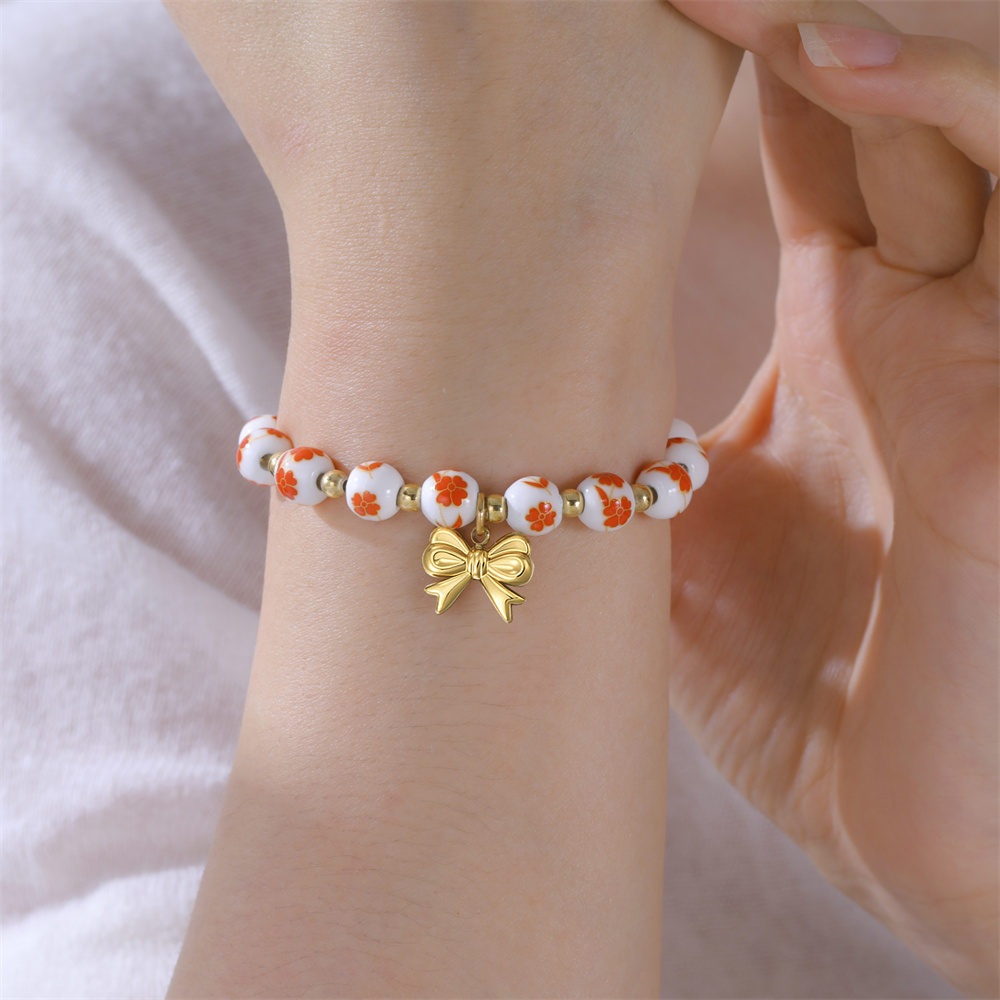 カラフルなセラミックビーズブレスレット女性用ボウチャームボヘ - Ceramic Link Bracelet のレビューと価格